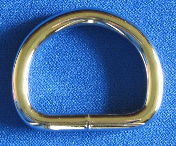Shiny D-ring accessory on fabric