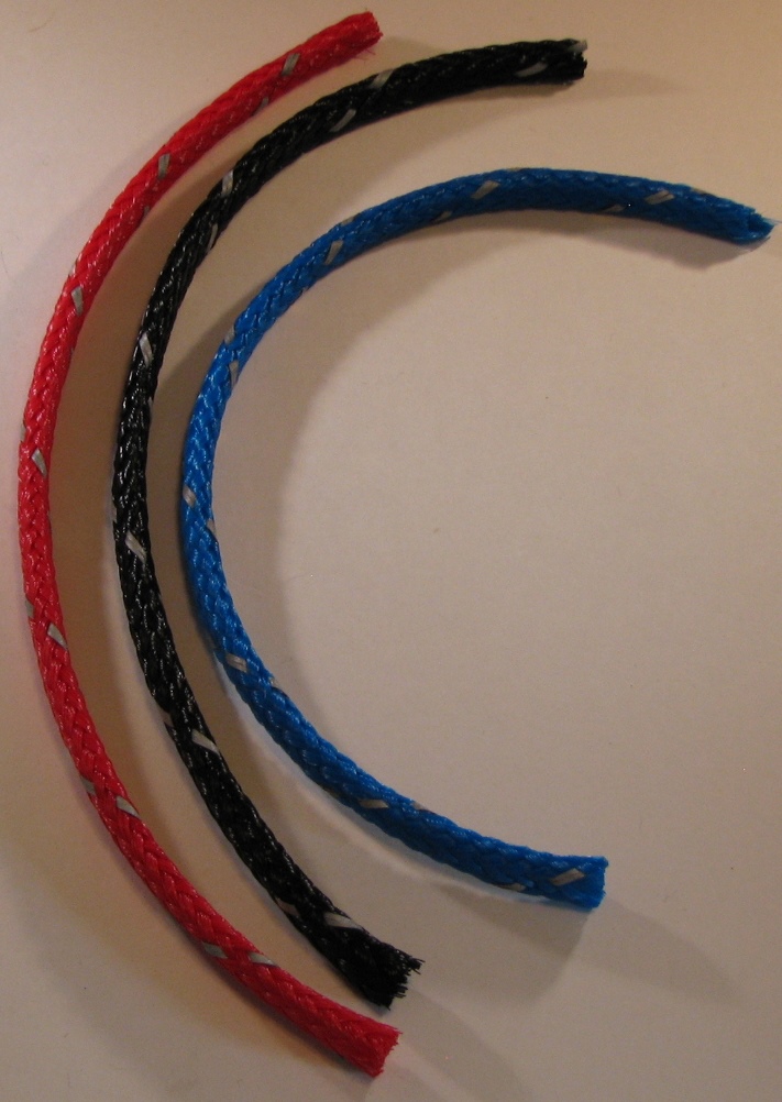 Curved ropes in red, black, blue