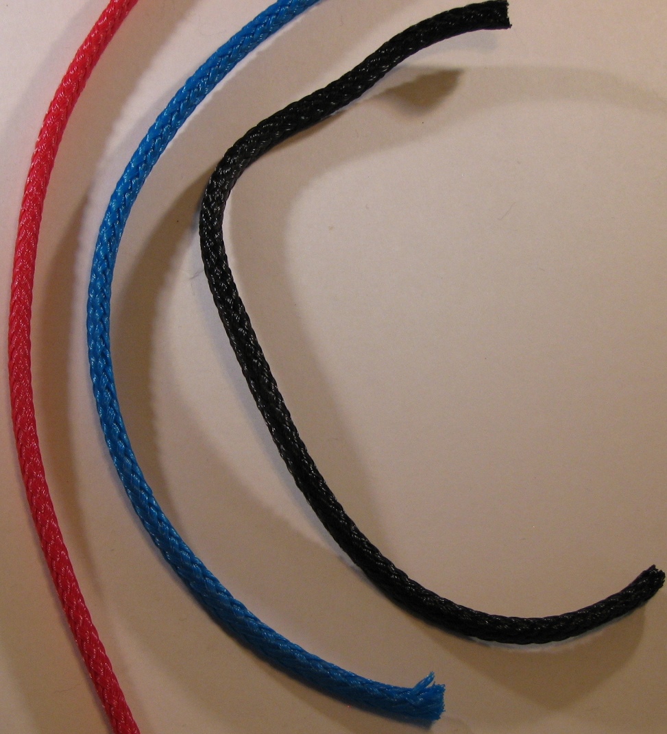 Three colored cords arranged on surface