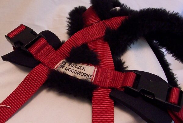 Fuzzy red pet harness with buckles