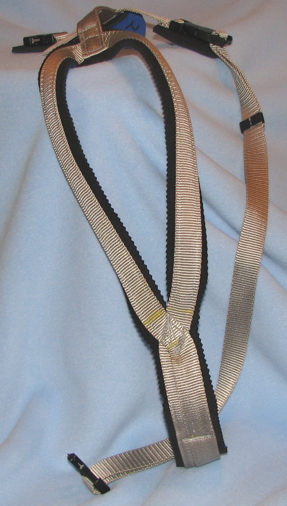 Climbing gear on light blue background